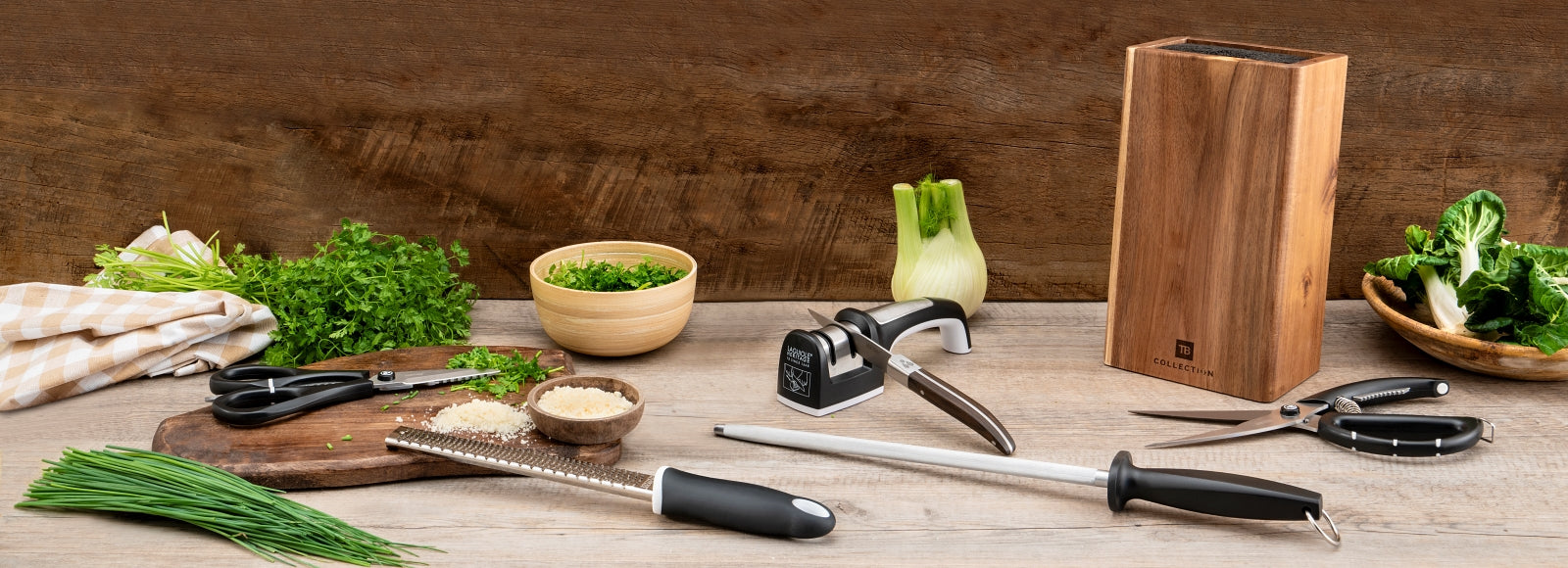 several laguiole heritage accessories on a wooden table 